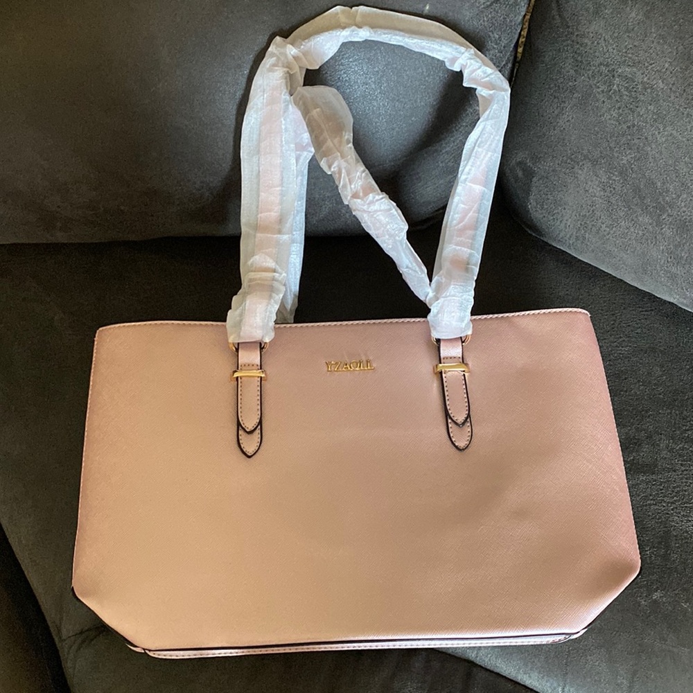YZAOLL pink shoulder bag. One side zipper inside and two pouches.
